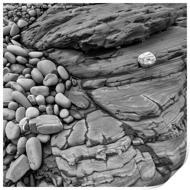 Rocks on the beach at Sandymouth (mono) Print by Derek Daniel