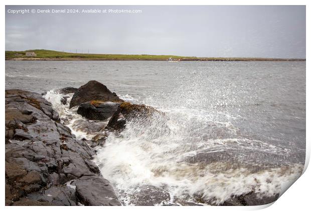 Waves crashing into the rocks at Staffin Bay Print by Derek Daniel