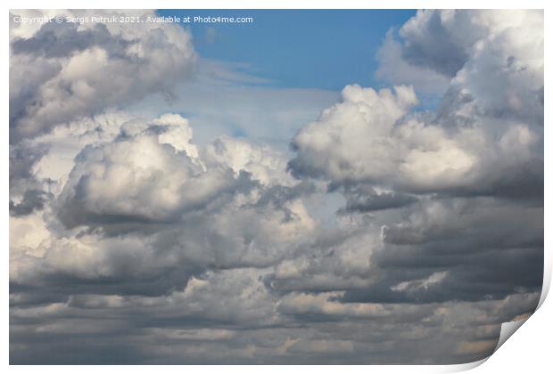Cumulus clouds are gradually covering the blue sky. Print by Sergii Petruk
