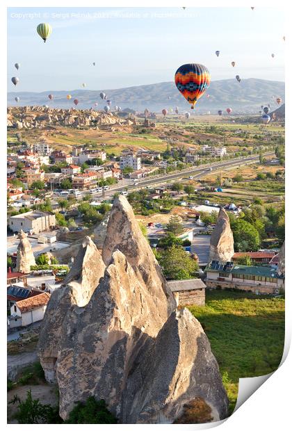 Dozens of balloons fly over the city of Goreme in Turkey and over the valleys of Cappadocia. Print by Sergii Petruk