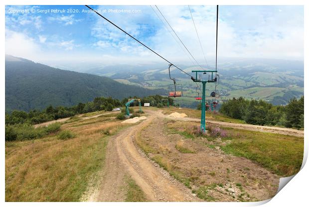 The mountain lift carries tourists and luggage up and down the mountains Print by Sergii Petruk