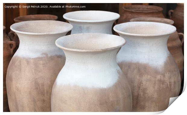 Large clay amphorae for water in a row for sale Print by Sergii Petruk