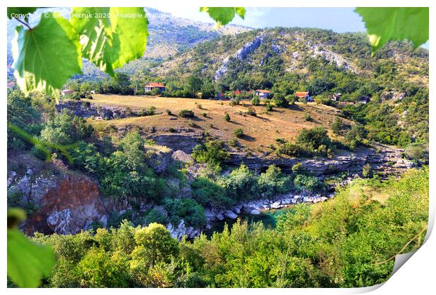 View of the mountain river overcoming rocky shores and stone rapids among the countryside in the mountains of Montenegro. Print by Sergii Petruk