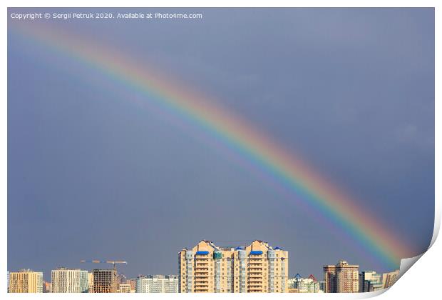 Rainbow in the sky above the city after a thunderstorm. Print by Sergii Petruk