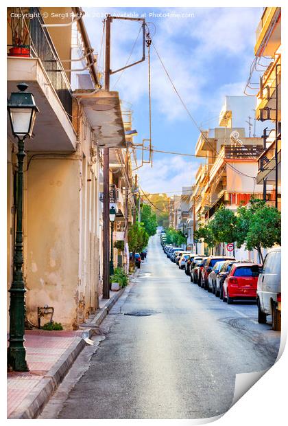 Deserted old narrow street of Loutraki in Greece in the early morning in the rays of the rising summer sun. Print by Sergii Petruk