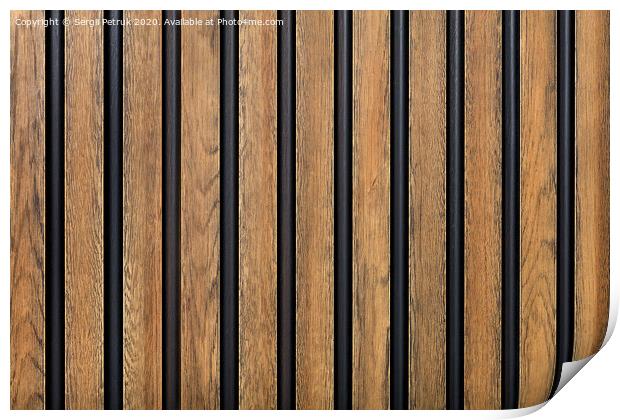 A fence made of vertical wooden decorative strips located parallel to each other. Print by Sergii Petruk