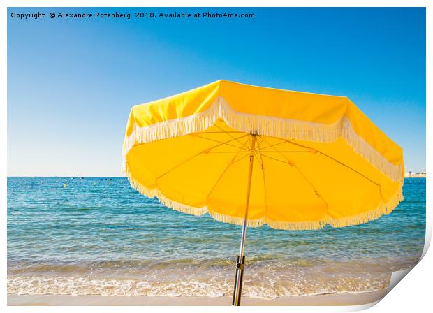 Giant yellow beach umbrella next to the ocean agai Print by Alexandre Rotenberg