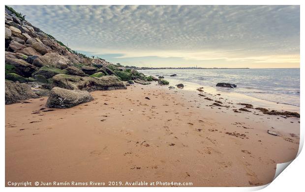 Small wet sand beach surrounded by steep rocks cli Print by Juan Ramón Ramos Rivero