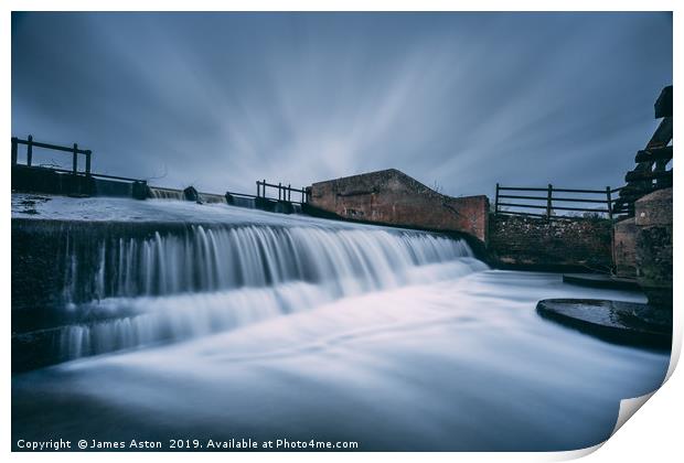 Slow Moving Water over the Weir Print by James Aston