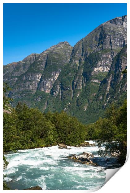 River through the mountains near Briksdals Glacier Print by Andrew Michael