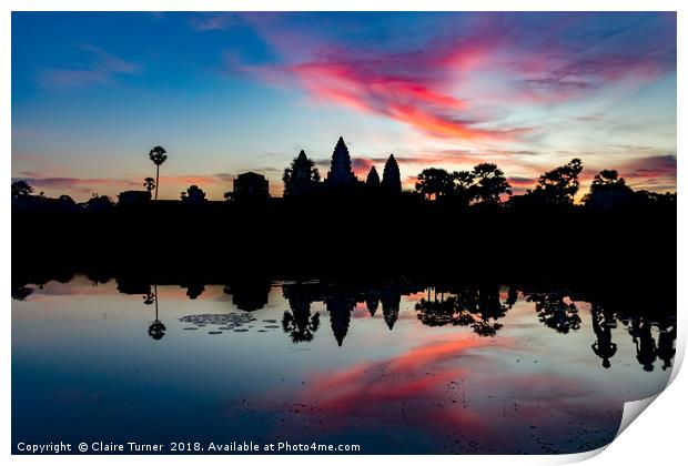 Pink sunrise at Angkor Wat Print by Claire Turner