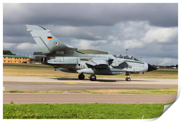 A German Tornado taxi`s to the runway Print by Clive Wells