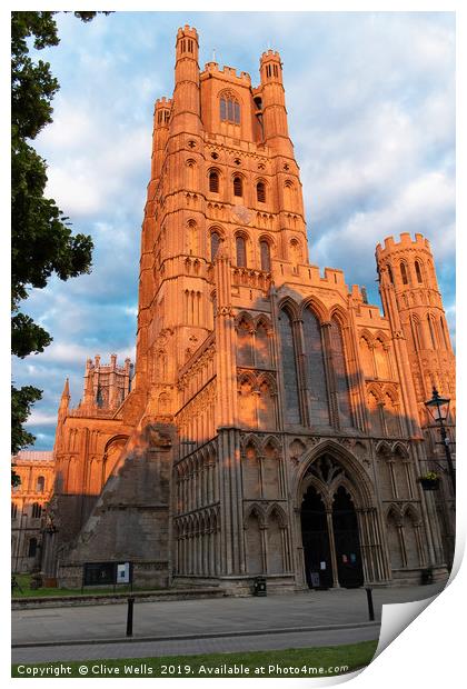 Tower turning red in the late sunset Print by Clive Wells