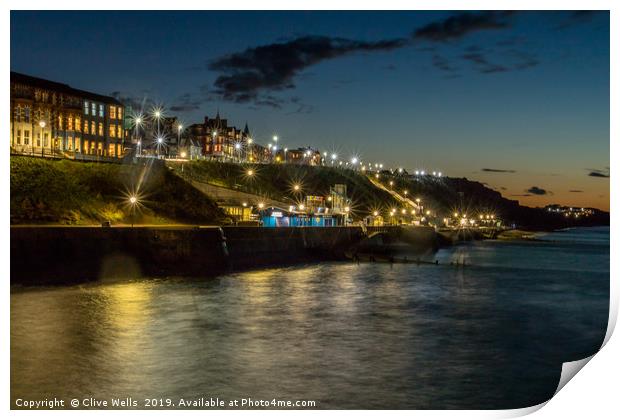 Cromer at night taken from the pier in Norfolk Print by Clive Wells