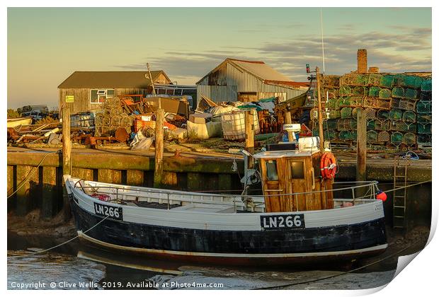 Fishing boat at Brancaster Staith in Norfolk Print by Clive Wells