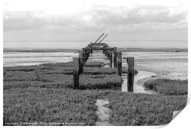 Black & white picture of the old pier at Snettisha Print by Clive Wells