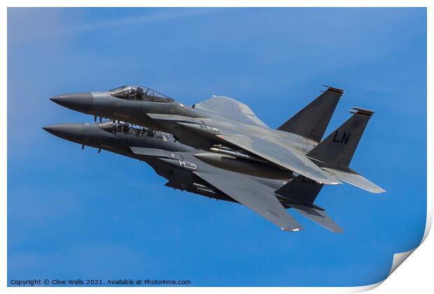 A pair of F-15 Eagles overfly Print by Clive Wells