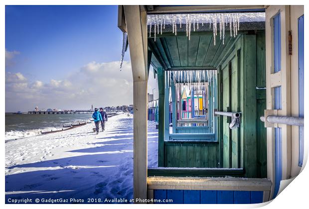 Icicles through the Beach Huts on a Winters day Print by GadgetGaz Photo