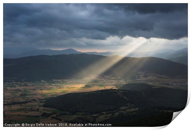 The sunrays through the clouds Print by Sergio Delle Vedove