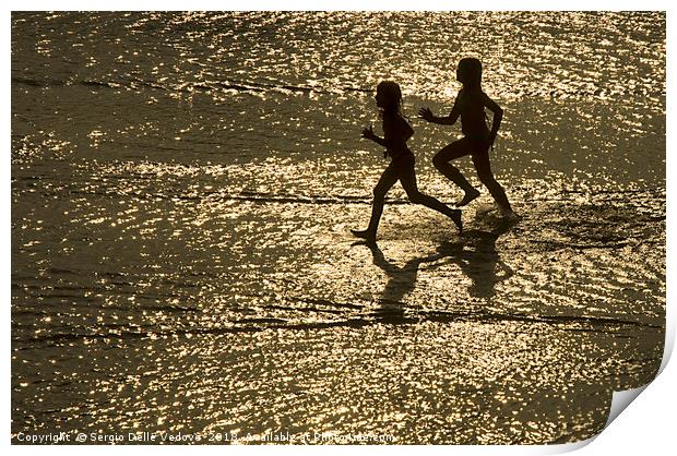 two children run by the sea Print by Sergio Delle Vedove