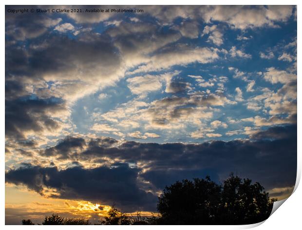 Cloudy sunset Print by Stuart C Clarke