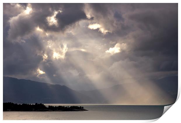 Turbulent sky above a Norwegian fjord Print by John Stuij