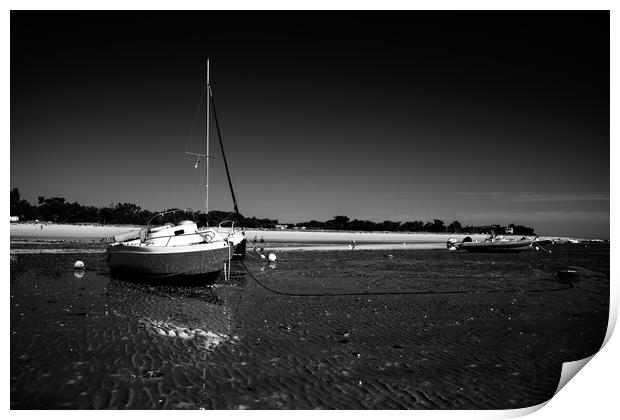 boats laying on the beach in blackwhite Print by youri Mahieu