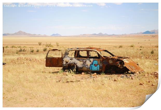 Abandoned car somewhere in Namibia Print by Damien Zasikowski