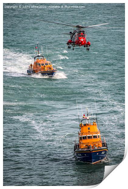 Lifeboats with the rescue helicopter on stormy sea Print by kathy white