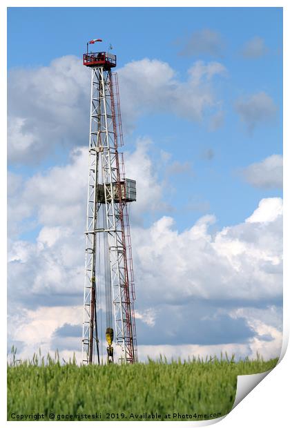 oil drilling rig and blue sky Print by goce risteski