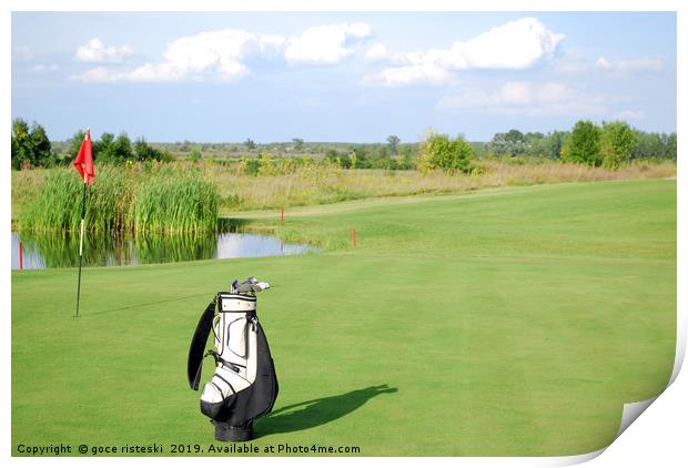 white golf bag on golf course Print by goce risteski