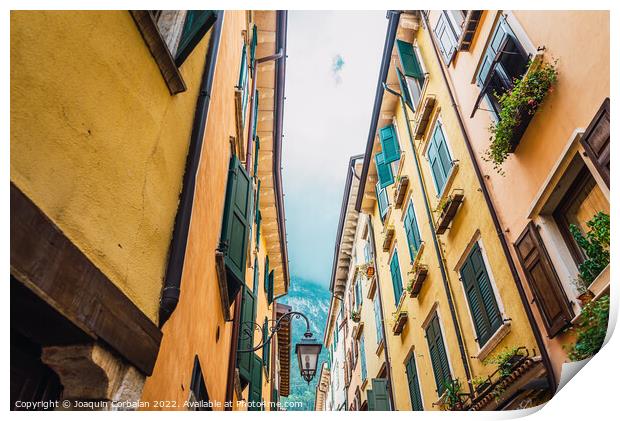 Old and narrow streets of beautiful typical Italian colors on a  Print by Joaquin Corbalan