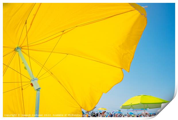 Beach holiday background, with a large yellow umbrella in the fo Print by Joaquin Corbalan