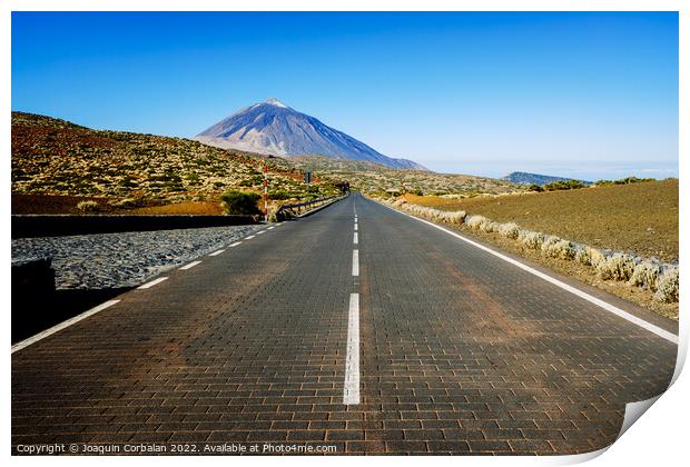 A paved road leads adventurous tourists to the highest peak in S Print by Joaquin Corbalan