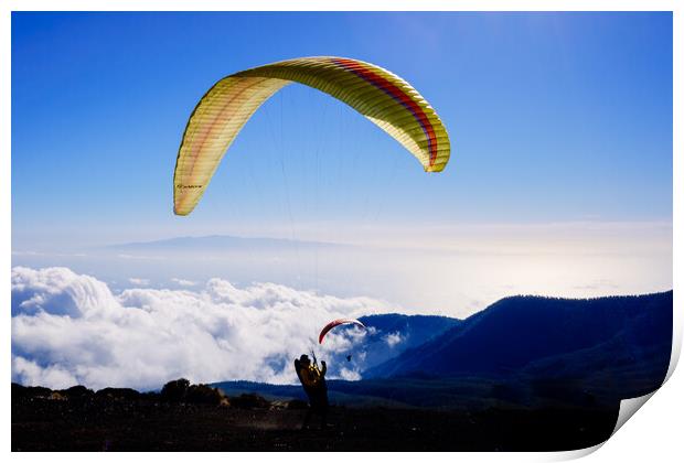 Skydiving experts and monitors prepare the sail of a paraglider  Print by Joaquin Corbalan