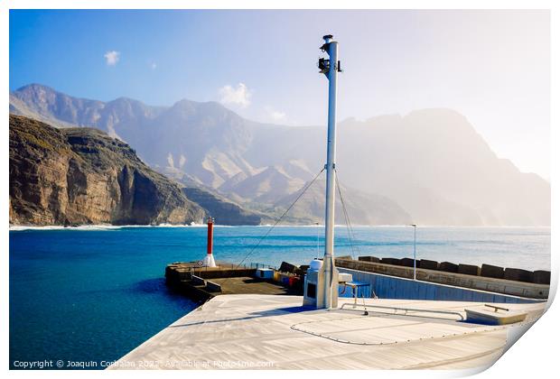 Entrance to the mouth of the port of Agaete with the beautiful c Print by Joaquin Corbalan