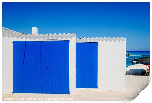Fisherman's hut with white walls and colorful blue wooden doors  Print by Joaquin Corbalan