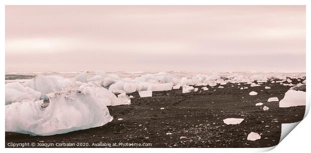 Giant ice blocks detached from icebergs on the coast of an Icelandic beach. Print by Joaquin Corbalan