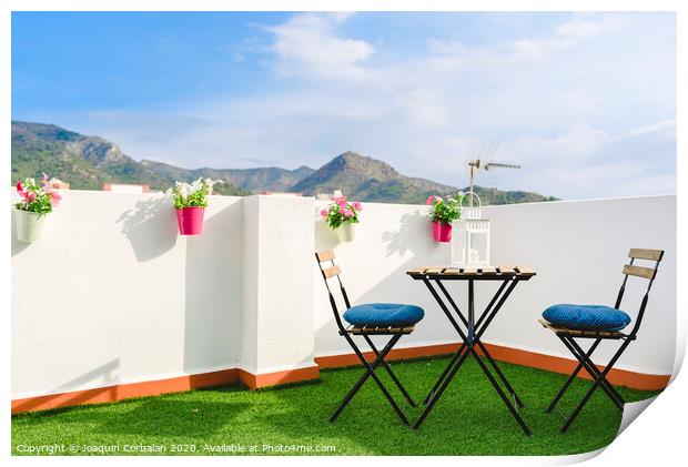 Beautiful white terrace with chairs and coffee table overlooking the Mediterranean mountain, blue sky. Print by Joaquin Corbalan