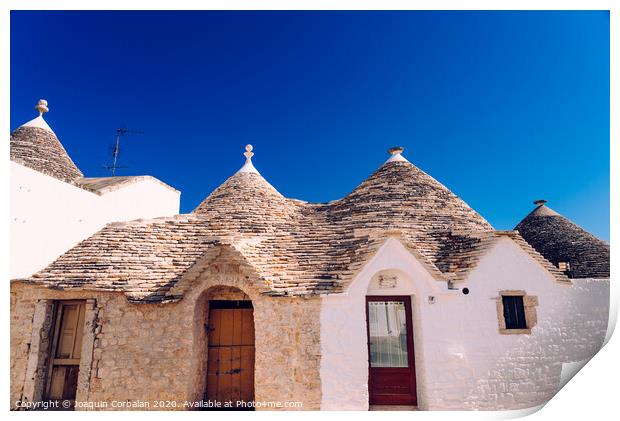 Houses of the tourist and famous Italian city of Alberobello, with its typical white walls and trulli conical roofs. Print by Joaquin Corbalan