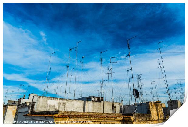 Old buildings in the city of Bari with roofs full of old television antennas. Print by Joaquin Corbalan