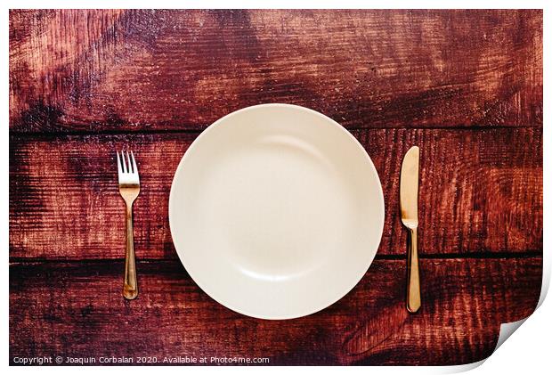 Empty plate with cutlery, top view, concept of intermittent fasting diet to lose weight. Print by Joaquin Corbalan