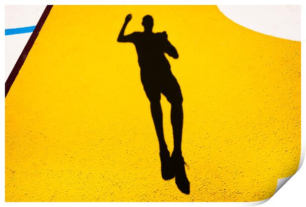 Shadow and silhouette of a man jumping on a yellow painted floor. Print by Joaquin Corbalan