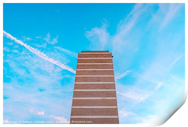 High housing building with blue sky in the background and copy space. Print by Joaquin Corbalan