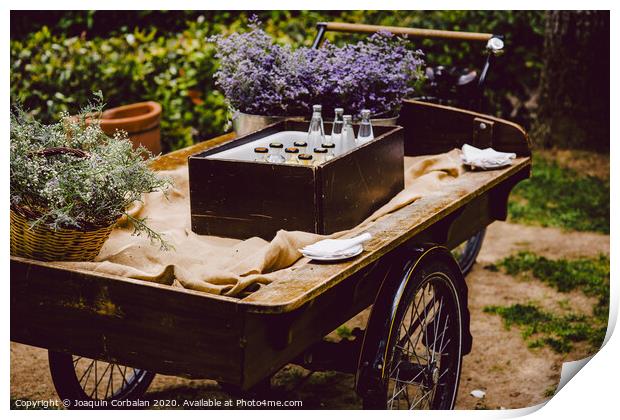 Old wooden cart to transport goods used for decoration at a wedding. Print by Joaquin Corbalan