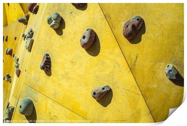 Detail of the wall of an outdoor climbing wall to practice climbing Print by Joaquin Corbalan