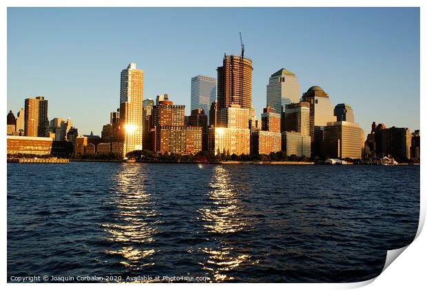  View of Riverside Park next to the city skyline at sunset from the Hudson River. Print by Joaquin Corbalan