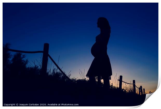Silhouette of pregnant woman at sunset with solid color background. Print by Joaquin Corbalan
