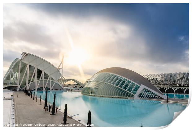 Panoramic cinema in the city of sciences of Valencia, Spain, visited by tourists next to the museum of sciences of the city in the background, at dawn with clouds and sun. Print by Joaquin Corbalan
