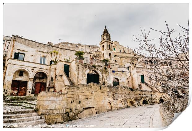 Long panoramic views of the rocky old town of Matera with its stone roofs. Print by Joaquin Corbalan